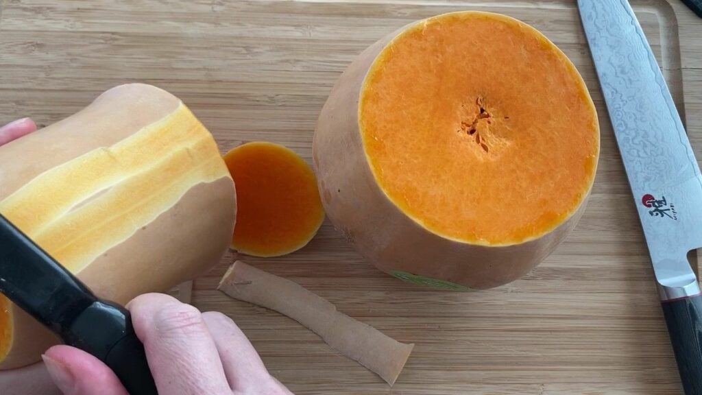 peeling Butternut squash with a vegetable peeler