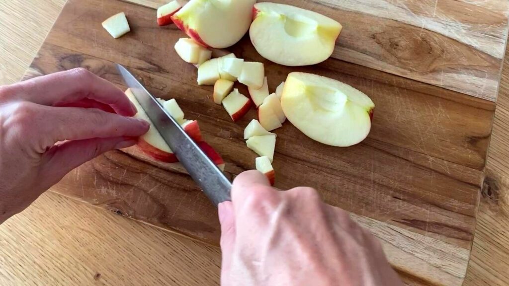 chop apples for low calorie pumpkin muffins