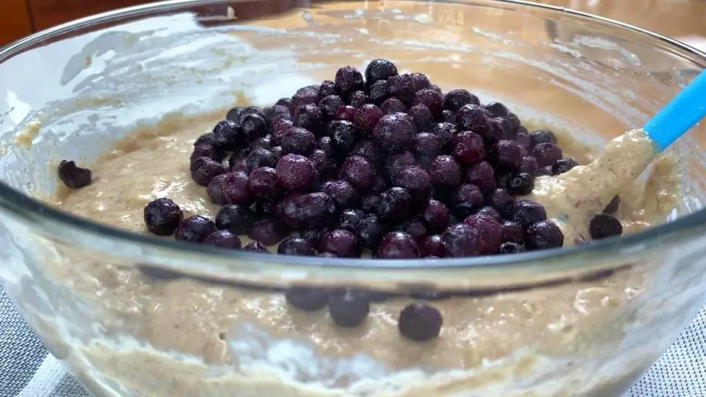 muffin batter and blueberries