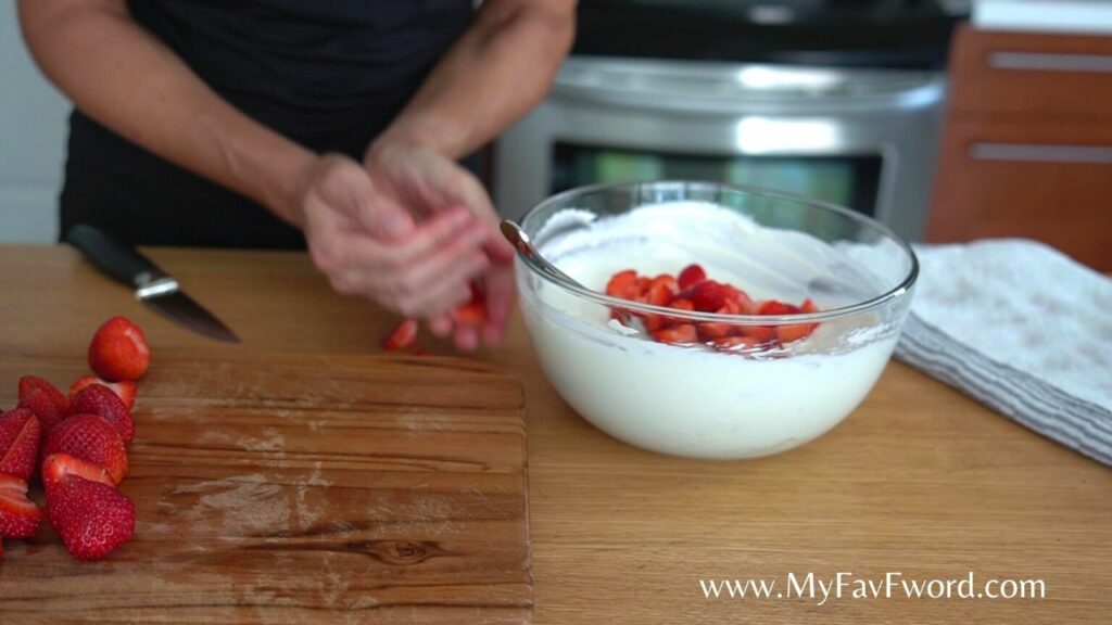 strawberries into cheese mix