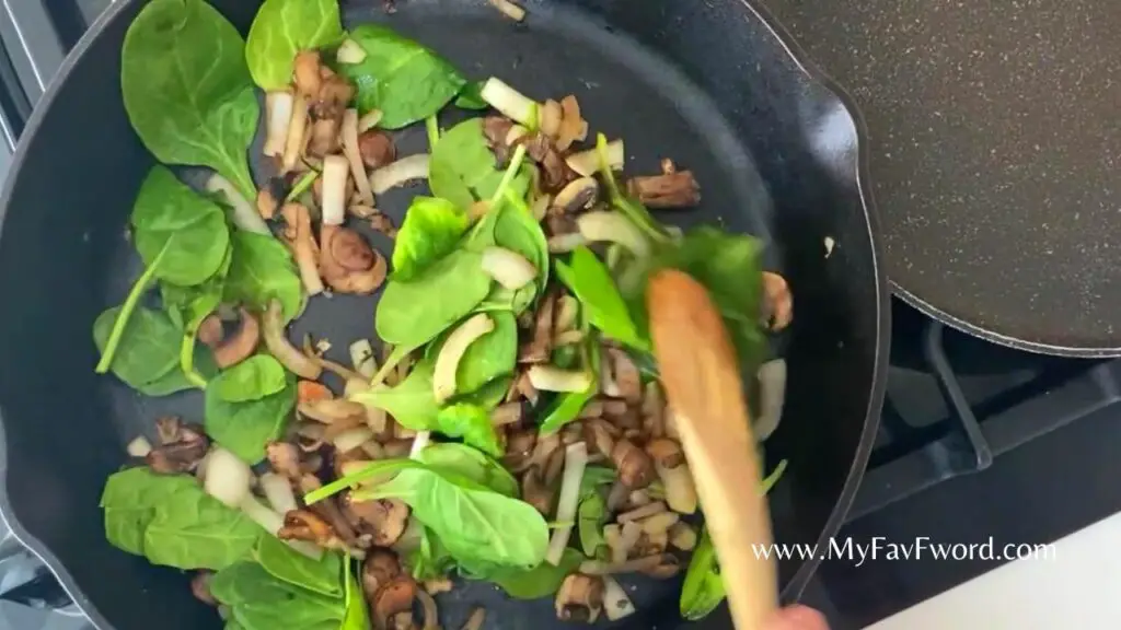 add spinach to mushrooms and onions