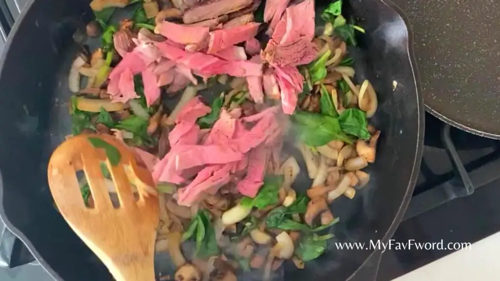 add steak to vegetables