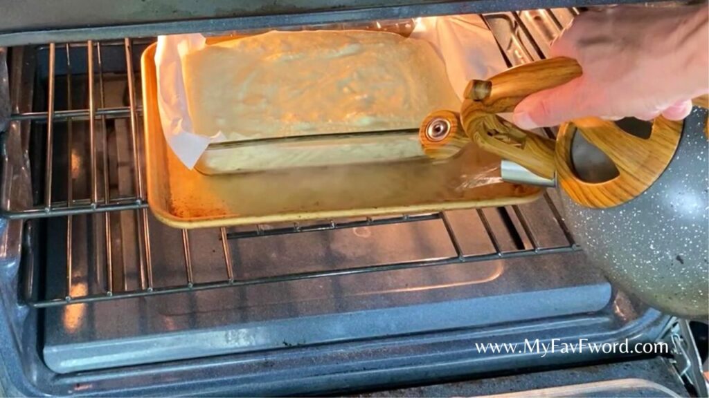 pour hot water onto baking tray