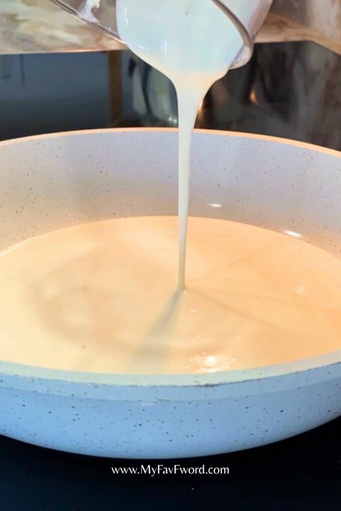 heating up the sauce for high protein mac and cheese
